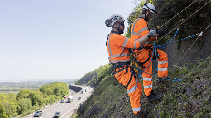Abseiling engineers carry out surveys above the M5 Wynhol Viaduct